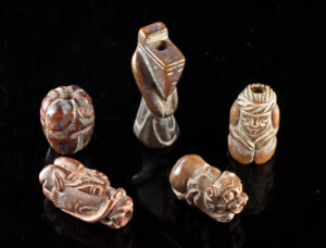 Lot 56, Auction 3/19/2026: Five Chinese Carved Stone Charm Beads