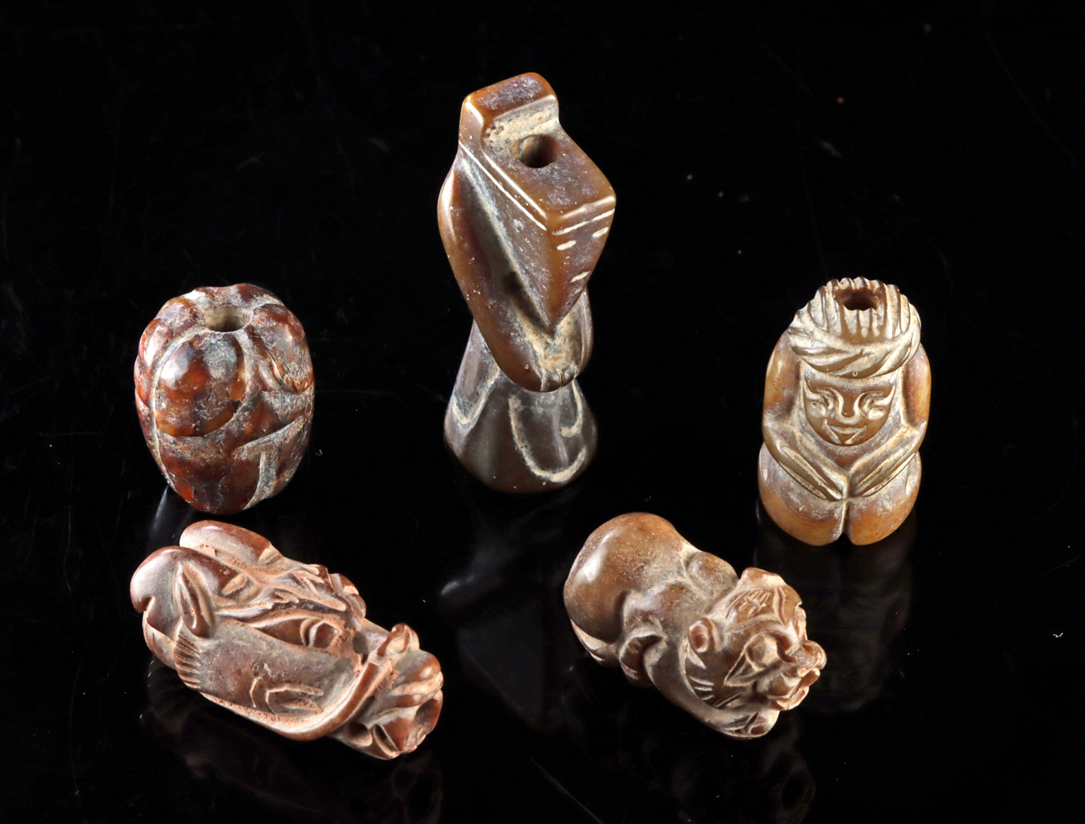 Lot 56, Auction 3/19/2026: Five Chinese Carved Stone Charm Beads
