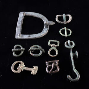 Lot 114, Auction 3/19/2026: 10 Roman Bronze Belt Buckles, Clasps & Attachments