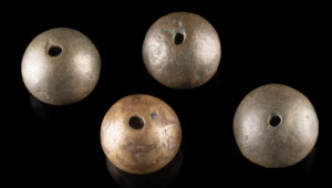 Lot 305, Auction 3/19/2026: Four Spanish Colonial Copper Bola Sling Weights