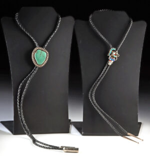 Lot 269, Auction 3/19/2026: 2 Silver Bolo Ties, Zuni Dancer by Lavonne Lalio