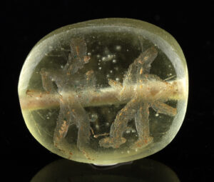 Lot 80, Auction 3/19/2026: Sasanian Glass Stamp Seal with Warrior Combat