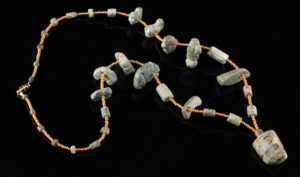 Lot 161, Auction 3/19/2026: Mesoamerican Greenstone Bead Necklace + Face Pendant