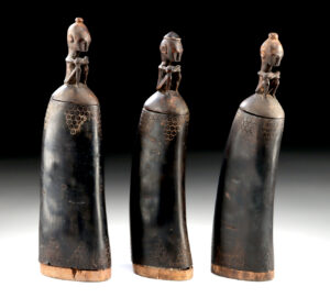 Lot 13, Auction 3/19/2026: Three Toba Batak Medicine Horns w/ Figural Stoppers