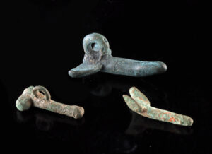 Lot 115, Auction 3/19/2026: Three Roman Phallic Fascina Amulets - Bronze & Lead