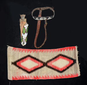 Lot 262, Auction 3/19/2026: Navajo Textile, Horse Bridle & Beaded Doll Cradleboard
