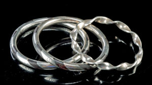 Lot 313a, Auction 3/19/2026: 3 Spratling Silver & Ebony Bangle Bracelets