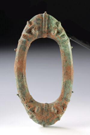 Lot 287a, Auction 3/19/2026: West African Brass Altar Ring Anklet w/ Relief Faces