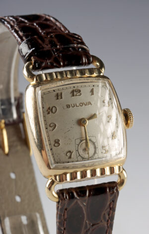 Lot 321a, Auction 3/19/2026: 10K Gold Plated Bulova Wristwatch, 10BC 15 Jewels