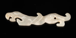 Lot 178a, Auction 4/3/2026: Chinese White Jade Archaic Style Tiger Pendant