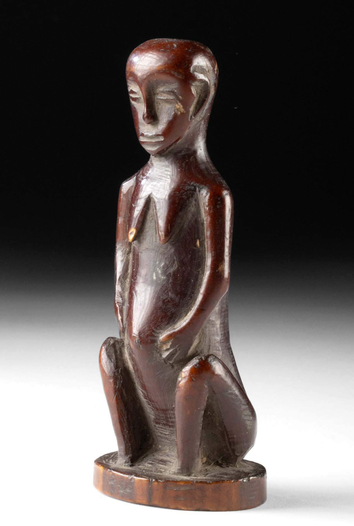 Lot 75b, Auction 4/12/2026: 19th C. African Lega Ivory Seated Nude Female Figure