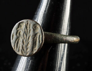 Lot 85b, Auction 4/12/2026: Roman Leded Brass Ring w/ Figures & Wheat Sheaf