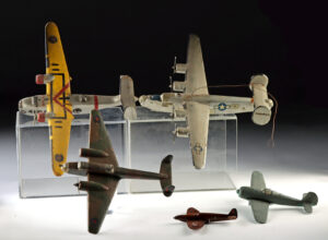 Lot 219, Auction 4/3/2026: Five WWII Painted Wooden Model Airplanes