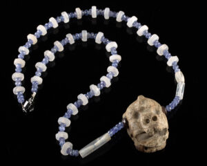 Lot 55, Auction 4/20/2026: Pre-Columbian Stone Face Pendant & Quartz Bead Necklace