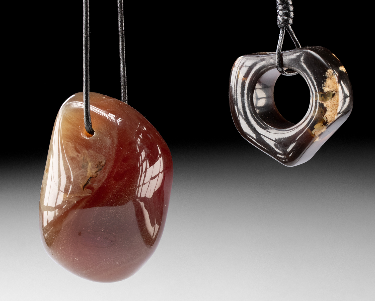 Lot 115, Auction 4/3/2026: Pair of Large Sumatran Amber Pendants