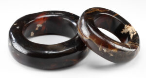 Lot 114, Auction 4/20/2026: Two Sumatran Polished Amber Bangle Bracelets