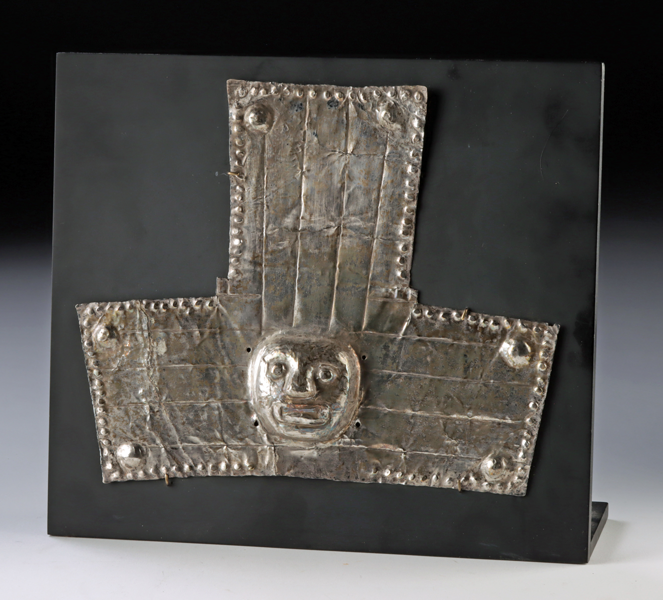 Lot 28, Auction 4/12/2026: Large Chimu Silver Headdress w/ Repousse Deity Head