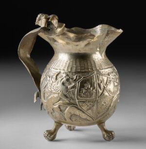 Lot 196e, Auction 4/3/2026: Large Peruvian Brass Pitcher w/ Heraldic Motifs