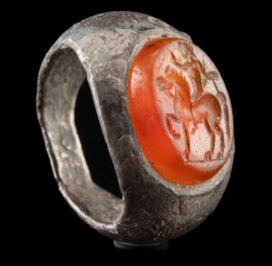 Lot 153a, Auction 4/20/2026: Roman Silver Ring w/ Carnelian Intaglio, Youth on Horse